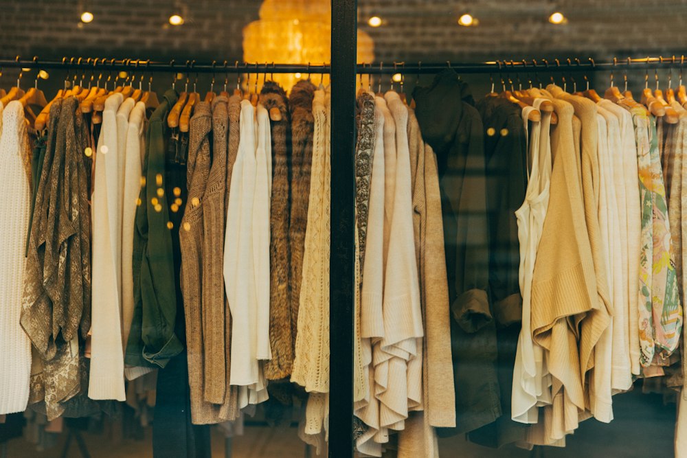 FashionUltra atelier - clothes rack with designer pieces